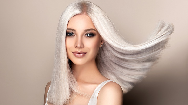 A blonde model showing off her platinum color