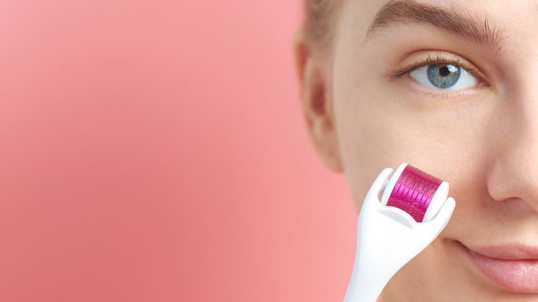 Woman having microneedling treatment