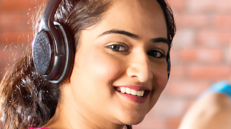 Women with headset working out