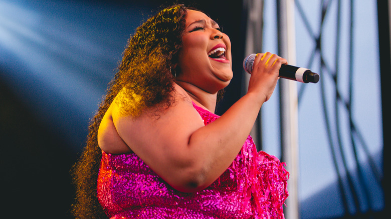 Lizzo performing on stage