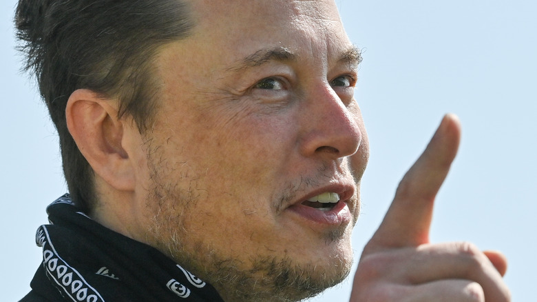 Elon Musk pointing