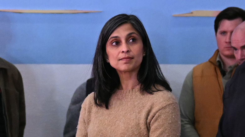 Usha Vance slightly smiling with her mouth closed