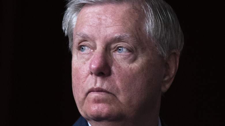 Senator Lindsey Graham looking to his right 