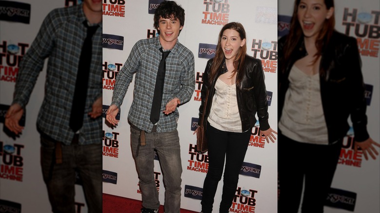 Charlie Mcdermott and Eden Sher at the premiere of "Hot Tub Time Machine"