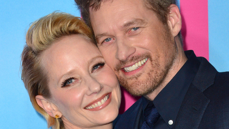 Anne Heche and James Tupper cheek-to-cheek