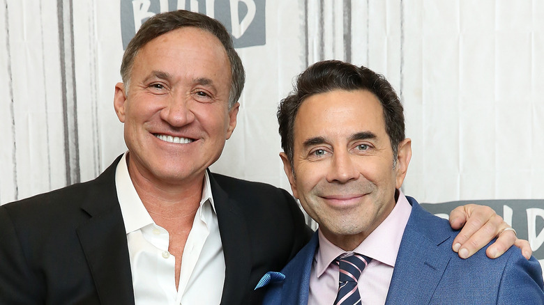 Dr. Terry Dubrow and Dr. Paul Nassif posing