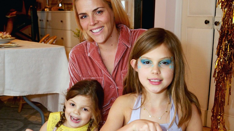 Busy Phillips posing with her daughters