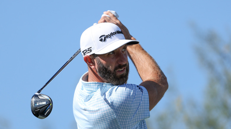 Dustin Johnson golfing