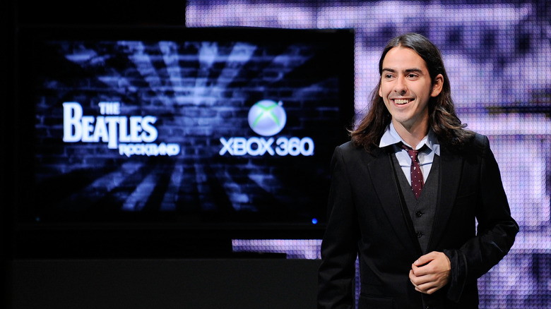 Dhani Harrison, son of Musician George Harrison, introduces the new video game "The Beatles: Rock Band" at the Microsoft XBox 360 E3 2009 gaming expo video game conference on June 1, 2009 in Los Angeles, California. The Electronic Entertainment Expo (E3) is a three-day event dedicated to the gaming industry.