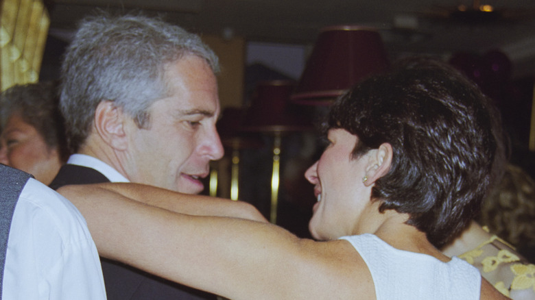 Jeffrey Epstein and Ghislaine Maxwell leaning on each other