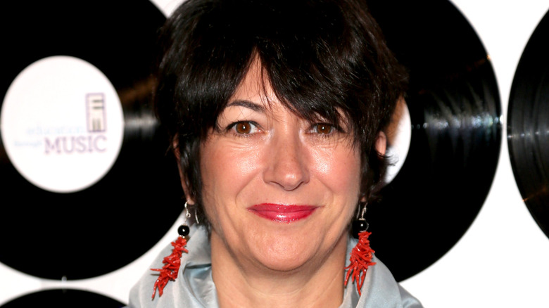 Ghislaine Maxwell smiling on step-and-repeat