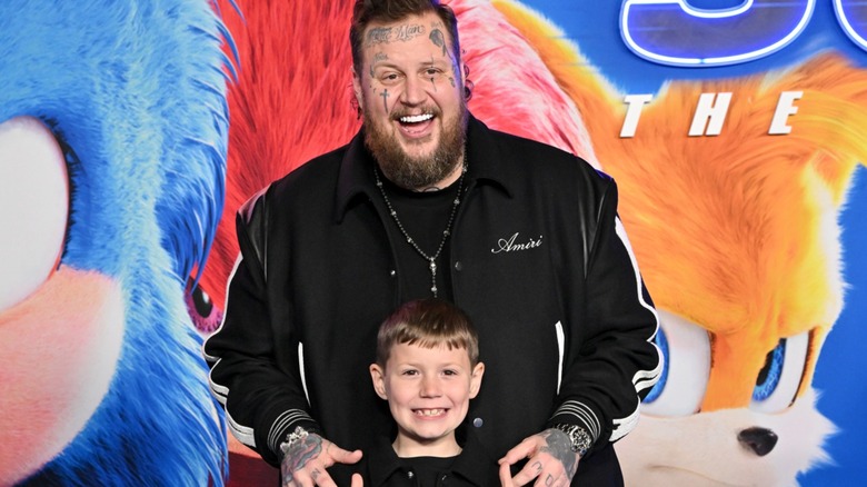 Jelly Roll and his son, Noah DeFord, smiling at the 'Sonic the Hedgehog 3' premiere