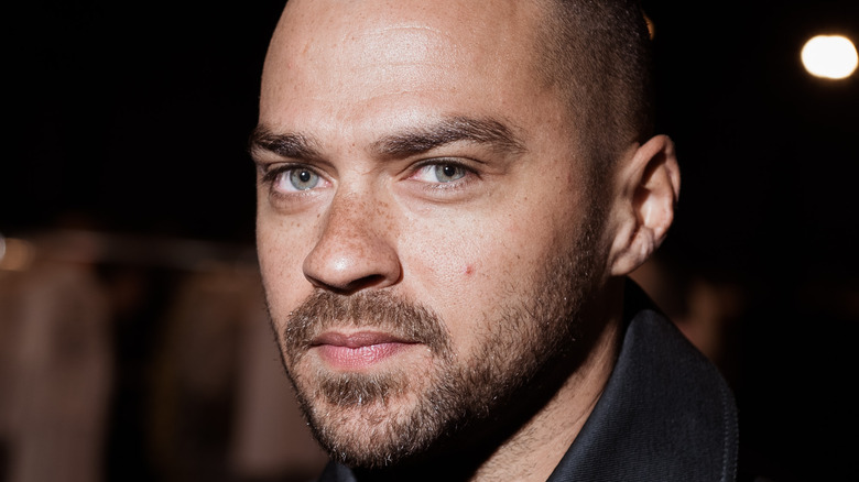 Jesse Williams poses on the red carpet