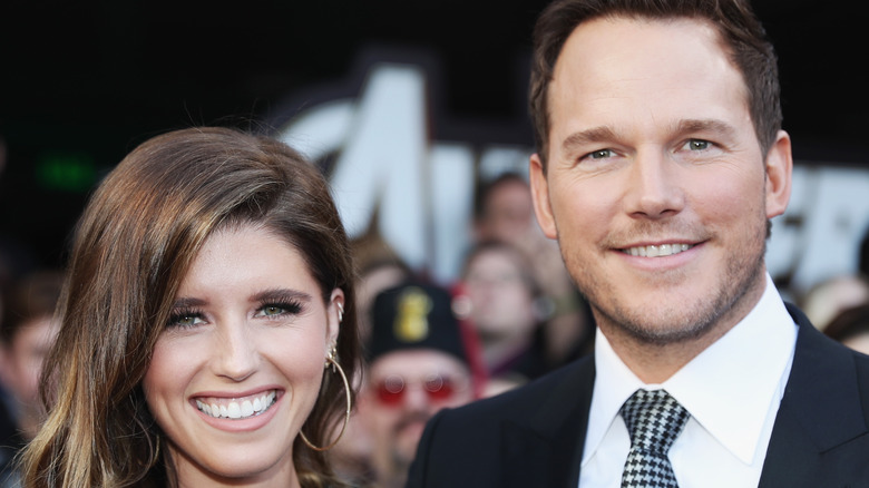 Katherine Schwarzenegger and Chris Pratt smiling together at an event