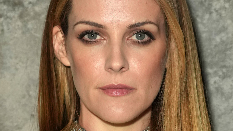 Riley Keough looking at camera