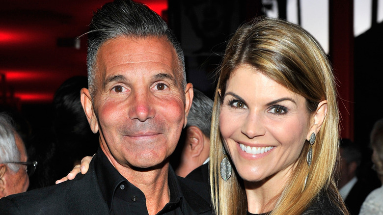 Lori Loughlin arm around Mossimo Giannulli