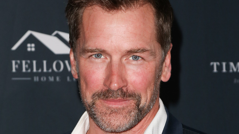 Paul Greene posing at event