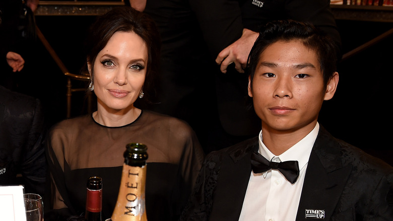 Angelina Jolie and Pax Jolie-Pitt at an event