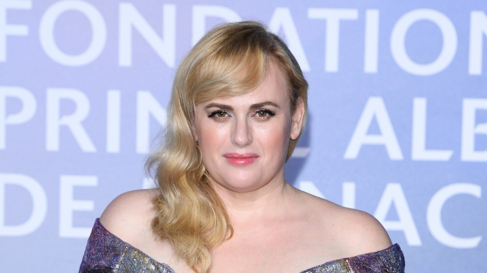 Rebel Wilson poses at an event