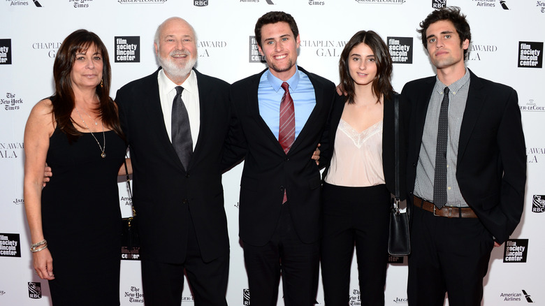 Michele and Rob Reiner posing with their children