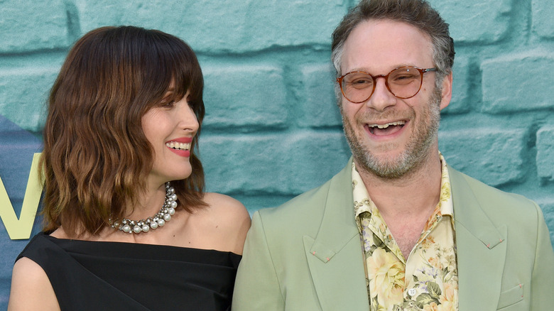 Seth Rogen and Rose Byrne smiling at an event