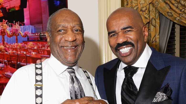 steve harvey and bill cosby smile together