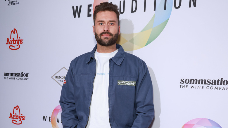 Dakota Mortensen white shirt blue jacket