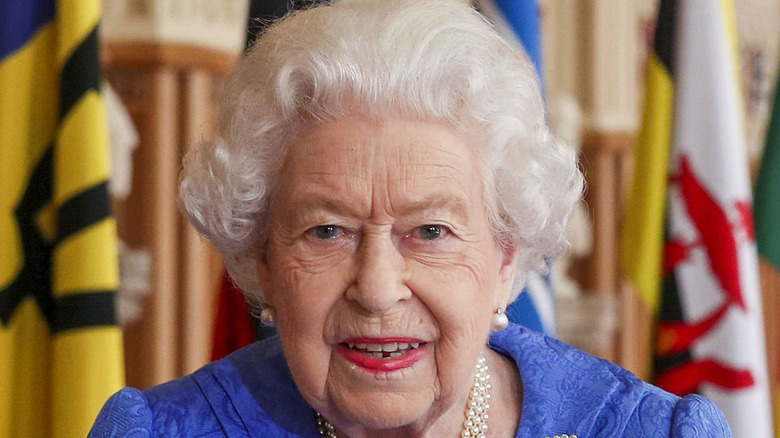 Queen Elizabeth in a blue suit on Commonwealth day