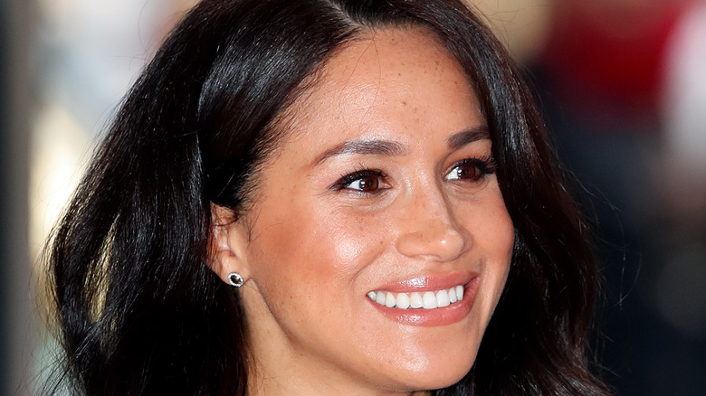 Meghan Markle smiles