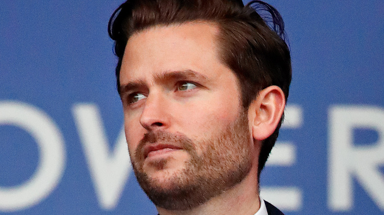 Jason Knauf attends an event