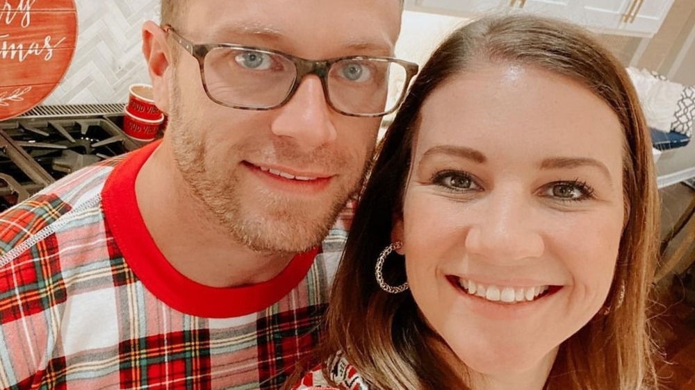 Adam and Danielle Busby of TLC's OutDaughtered posing for a selfie on Instagram