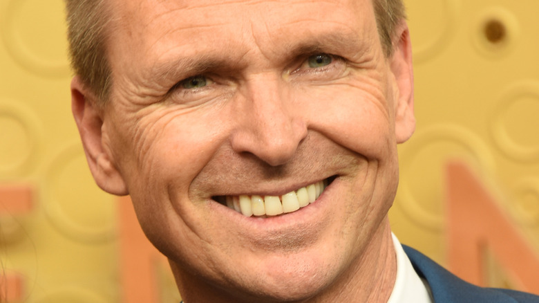 phil keoghan attending an event