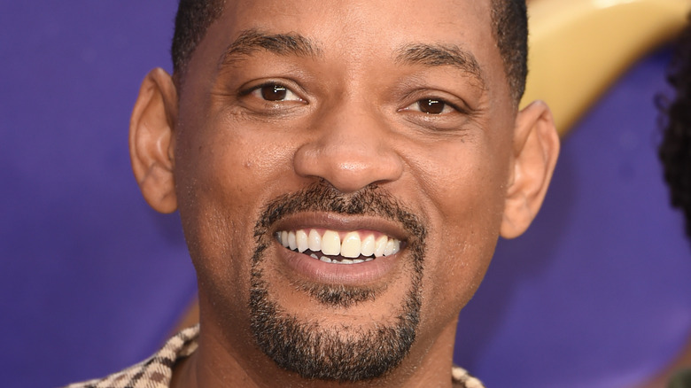 Will Smith smiling for photo