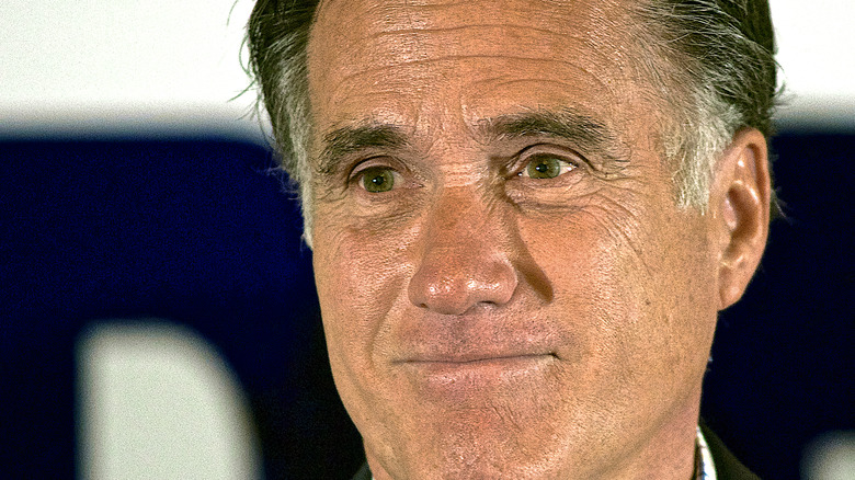 Mitt Romney with a tight smile