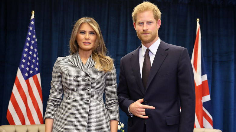 Prince Harry with Melania Trump posing