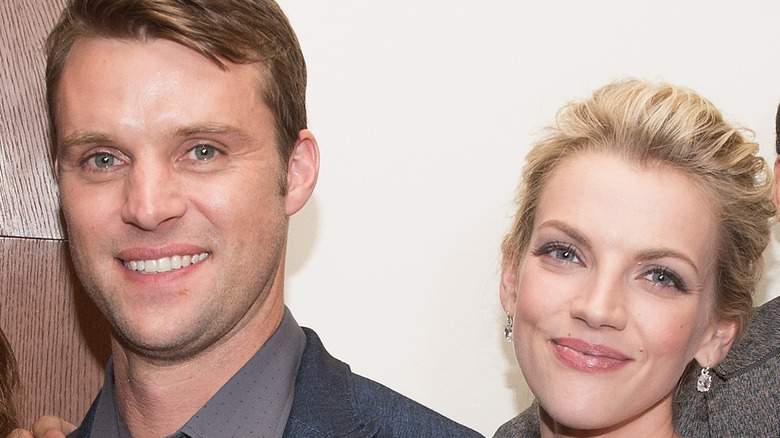 Jesse Spencer and Kara Killmer smiling 