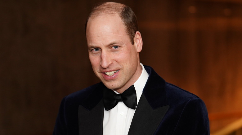 Prince William smiling in a tux 