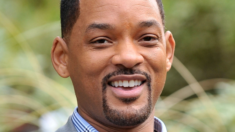 Will Smith smiles