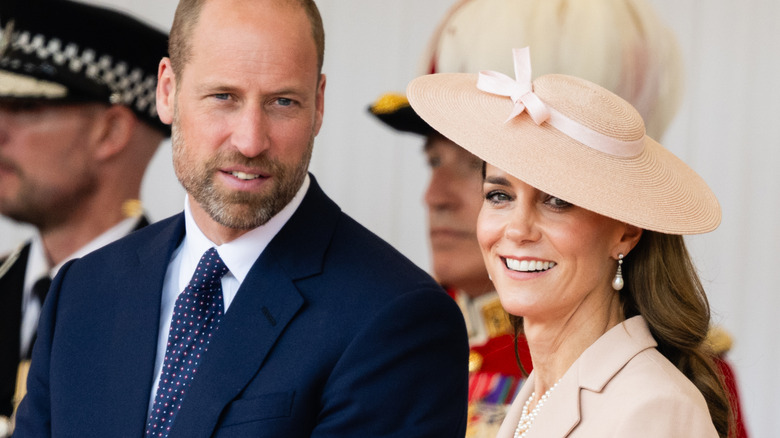 Princess Catherine and Prince William smiling next to each other