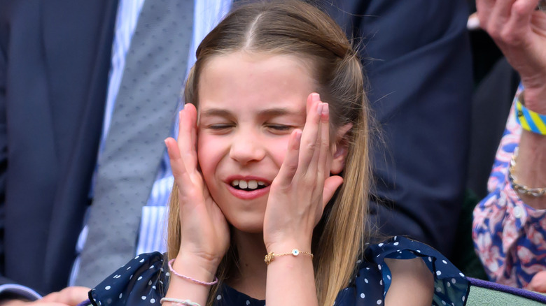 Princess Charlotte grabs her face at Wimbledon in 2024