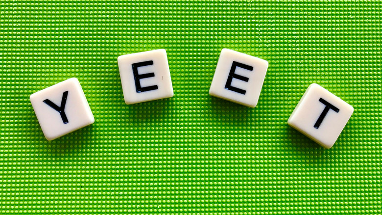 Scrabble tiles reading 'yeet'