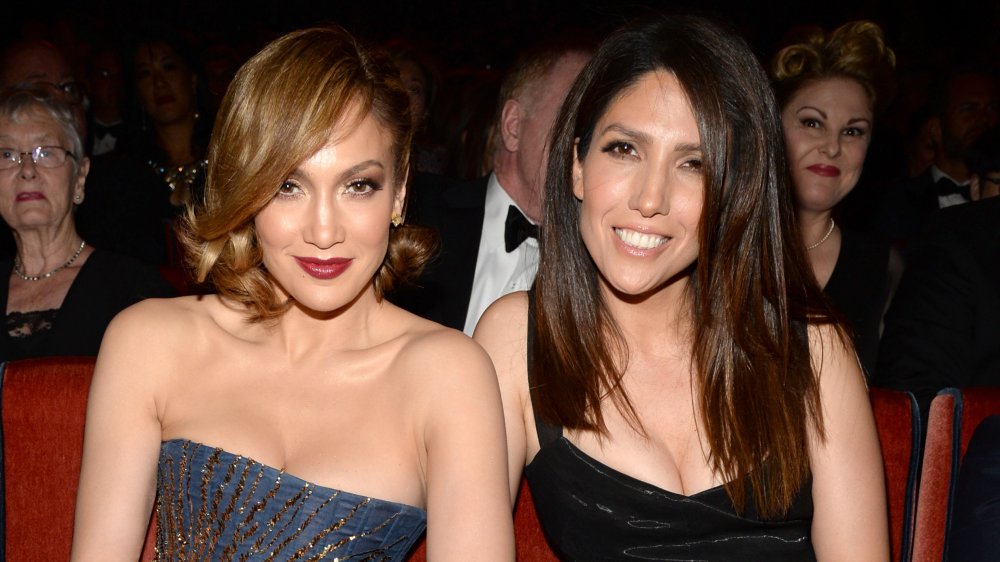 Jennifer Lopez and Lynda Lopez seated together at an award show.