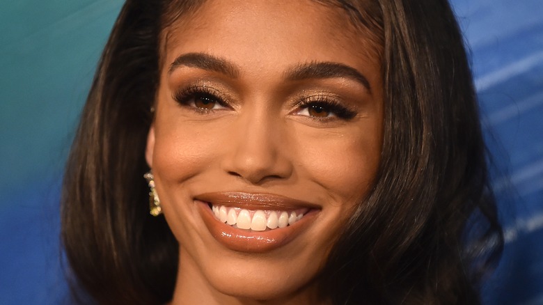 Lori Harvey smiling