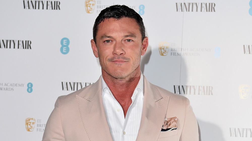 Luke Evans in blazer at event