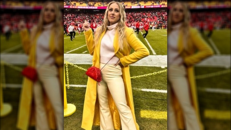 Brittany Mahomes posing on the sidelines