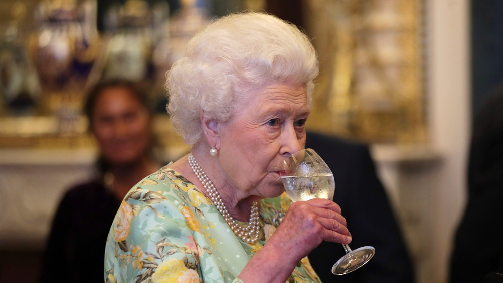 Queen Elizabeth drinking