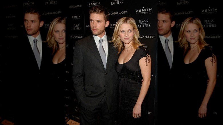 Ryan Phillippe and Reese Witherspoon on a step and repeat for Flags Of Our Fathers, shortly before their divorce