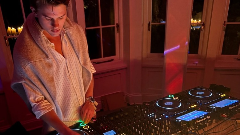Deacon Phillippe behind DJ decks