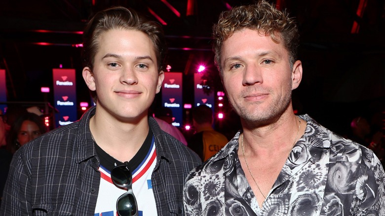 Ryan and Deacon Phillippe posing together at the 2022 Super Bowl