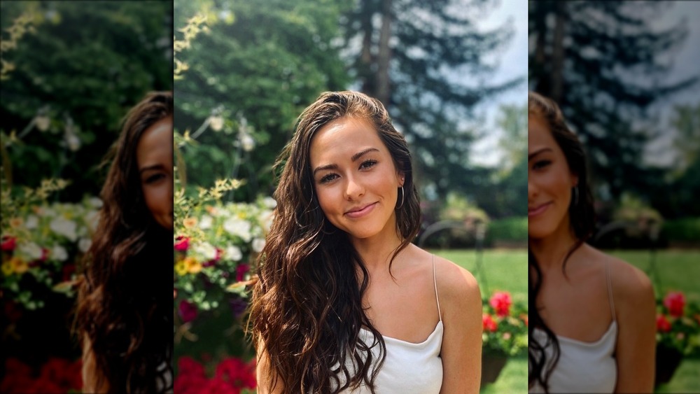 Bachelor's Abigail Heringer smiles by roses